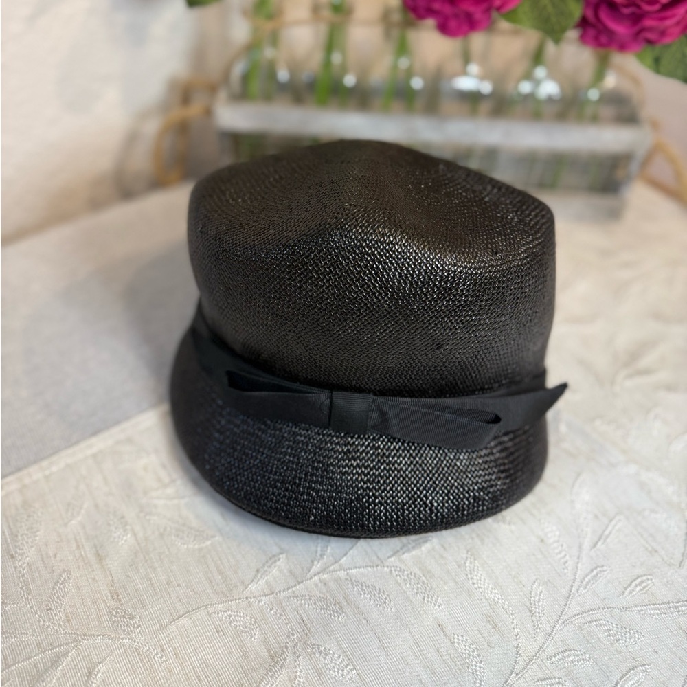Vintage Kutz Millinery Cellophane Braided Hat. Black with bow. Sits 4”‎ high.